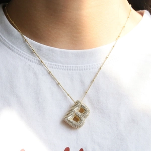 Puffy bubble letter B necklace in gold plating with full pave zircon stones for women