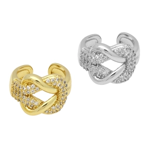 Ear cuff minimalisti in oro e argento con pavé di zirconi e un elegante design a nodo incrociato