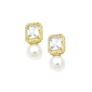 Macro detail of gold plated rectangle stud earrings with zircon and drop pearl