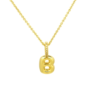 Macro detail of golden 3D bubble letter B pendant necklace with pavé zircon bail