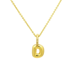 Macro shot of gold-plated balloon style letter D pendant with cubic zirconia inlay