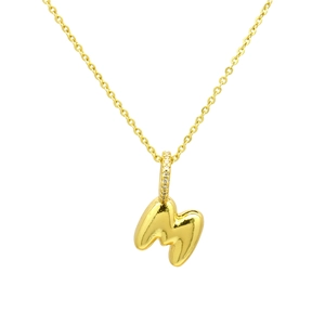 Detail of gold bubble letter M necklace pendant with sparkling cubic zirconia inlay