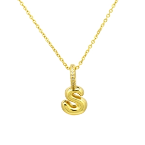 Macro view of gold bubble letter S pendant with zircon-studded bail on fine chain