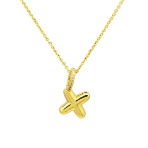Macro detail of 3D gold-plated bubble letter X pendant necklace with sparkling zirconia