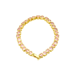 Detailed view of a gold-plated bracelet featuring heart-shaped pink zircon gemstones