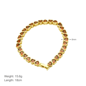 Elegant 18cm gold-plated tennis bracelet featuring 6mm heart-shaped red zircon stones