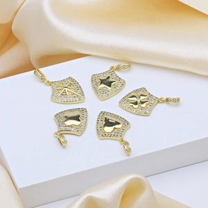 Five gold plated 18k zircon pendants with shield heart star and lucky clover shapes