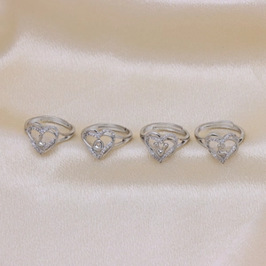 Silver heart rings set with zircon accents and LOVE letters in adjustable open style