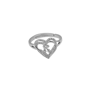 Macro detail of silver heart ring featuring letter K design and pavé cubic zirconia