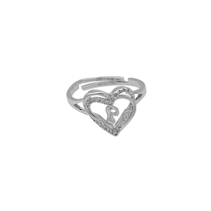 Detail of silver heart ring with zircon stones and initial P letter engraving