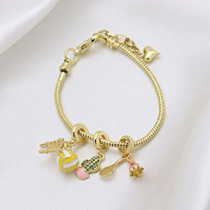 Golden snake chain bracelet with sports-themed pendants like volleyball and tennis charms