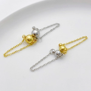 Detail of 14K gold and silver plated magnetic ball clasps for jewelry necklaces