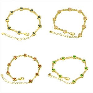 Gold heart bracelet set with colorful zircon stones in blue, pink, red and green colors