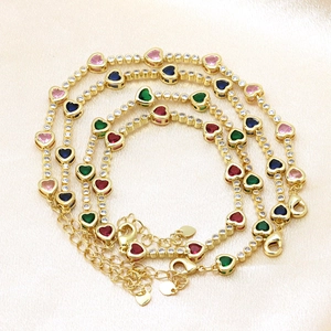 Gold-plated heart bracelets featuring colorful zircon stones and adjustable link chains