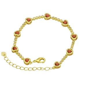 Detail of gold heart bracelet with red zirconia stones and adjustable extension chain