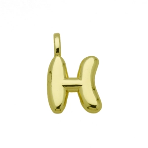 Detailed macro view of a golden bubble font letter H pendant with a smooth polished finish