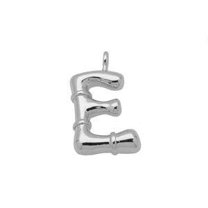 Close-up of silver letter E pendant with polished bamboo texture and metallic luster