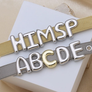 Customizable mesh belt bracelet with polished gold and silver sliding metal letters