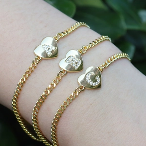 Golden heart initial bracelet with cubic zirconia on flat Cuban link chain for women