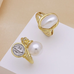 Vintage gold open ring set featuring St. Benedict coin and large pearl embellishments