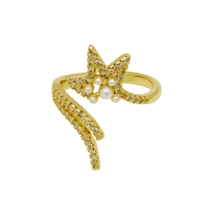 Detail of gold-plated open ring featuring crystal-paved stars and white pearls