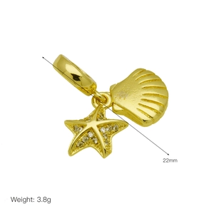 Detailed close-up of golden starfish and scallop shell charms with size and weight info