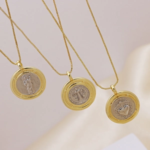 Two-tone 18k gold plated religious coin necklaces with heart and saint emblems