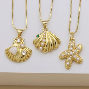 Ensemble de colliers dorés à thème océan avec perles, étoile de mer et coquillages
