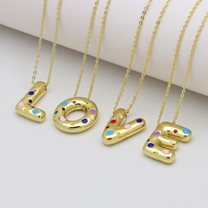 3D golden bubble letter LOVE pendants with colorful enamel dots on thin gold chains