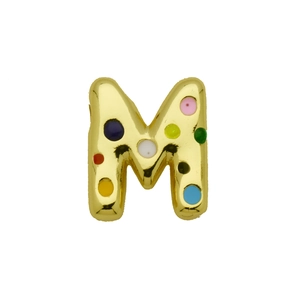 Macro detail of golden balloon letter M pendant featuring colorful enamel polka dots