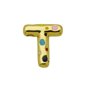 Close-up of golden balloon-style letter T pendant with colorful enamel dots