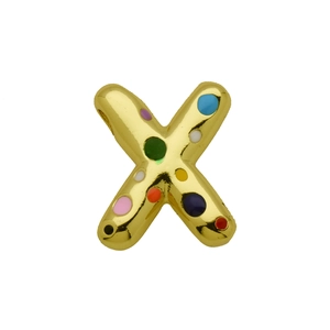 Macro detail of golden balloon letter X pendant with vibrant colorful enamel polka dots
