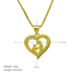 Detail showing gold heart pendant necklace for Mother Day with sparkling zircons