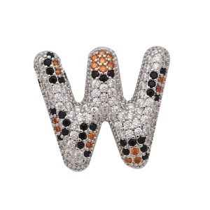 Detailed macro view of letter W bubble pendant with multi-color cubic zirconia stones