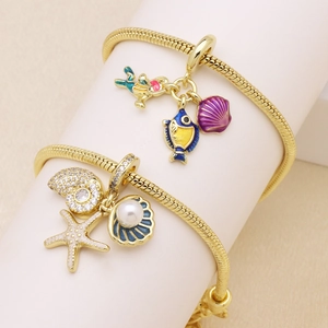 Gold snake chain bracelets set featuring colorful ocean-themed starfish and shell charms