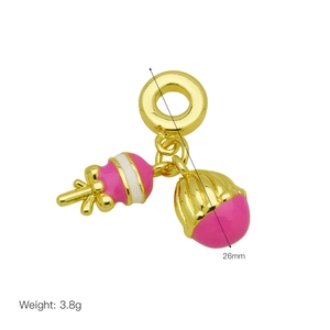 Detail showing dimensions of the gold pendant with pink enamel charms at 26mm and 3.8g