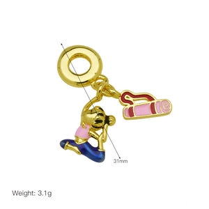 Macro detail of gold yoga pendant with pink enamel mat and 31mm height measurement
