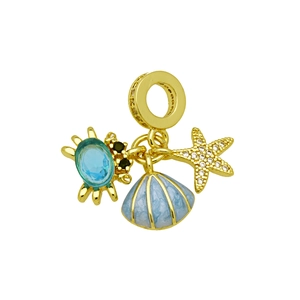 Detailed view of ocean-themed charms with blue crab, enamel seashell and starfish