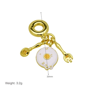 Creative fried egg pendant charm with miniature spoon and fork in gold-plated finish