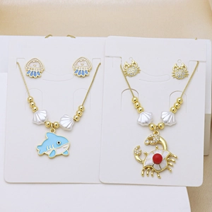 Set gioielli marini con ciondoli a forma di squalo e granchio per bambini in oro