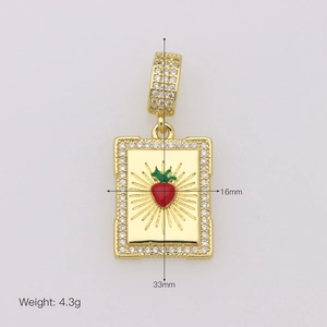 Macro shot of a 18K gold plated strawberry pendant with embedded crystals and dimensions