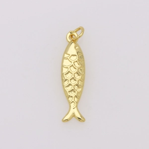 Detailed macro view of a golden fish pendant with engraved scales and 18K plating