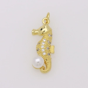Exquisite gold-plated seahorse pendant detail with pave-set zircons and a white pearl