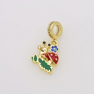 Macro shot of colorful enamel snail charm with mushroom shell and blue flower detail