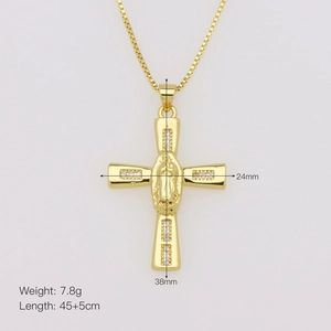 Detail of gold cross pendant with cubic zirconia inlay and 38x24mm size dimensions