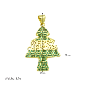 Dettaglio del ciondolo albero di Natale oro 18K con zirconi verdi e dimensioni