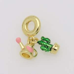 Detail of gold watering can and green cactus charms with pink enamel heart and sleek loop