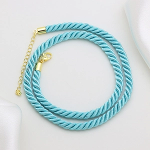 Light blue 6mm twisted polyester cord necklace with gold lobster clasp and extension chain