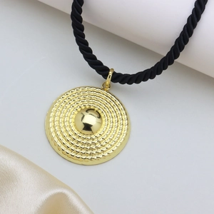 Golden concentric ripple circle pendant necklace with black twisted cord rope chain