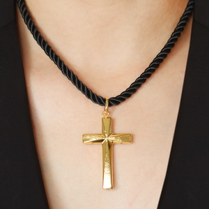 Fashionable gold textured cross pendant with black rope chain for a stylish religious look